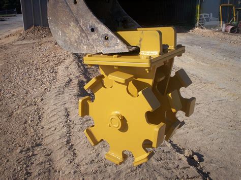 excavator compaction wheel|compactor wheel for excavators.